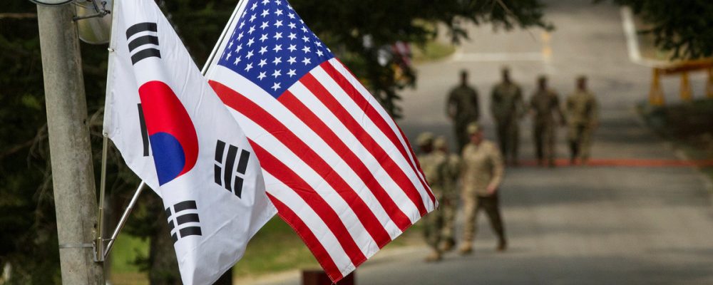 The South Korean and American flags fly next to each other at Yongin, South Korea, August 23, 2016. Picture taken on August 23, 2016.  Courtesy Ken Scar/U.S. Army/Handout via REUTERS    ATTENTION EDITORS - THIS IMAGE HAS BEEN SUPPLIED BY A THIRD PARTY. - RC171BED6EC0