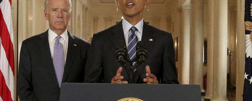 President Barack Obama, standing with Vice President Joe Biden, delivers remarks in the East Room of the White House in Washington, Tuesday, July 14, 2015, after an Iran nuclear deal is reached. After 18 days of intense and often fractious negotiation, diplomats Tuesday declared that world powers and Iran had struck a landmark deal to curb Iran's nuclear program in exchange for billions of dollars in relief from international sanctions. (AP Photo/Andrew Harnik, Pool)