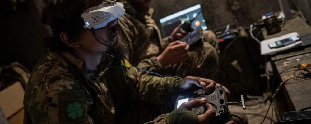 A Ukrainian serviceman of the attack drones battalion of the Achilles, 92nd brigade, operates a drone at his front line position, amid Russia's attack on Ukraine, near a Russian border in a Kharkiv region, Ukraine May 15, 2024. REUTERS/Inna Varenytsia