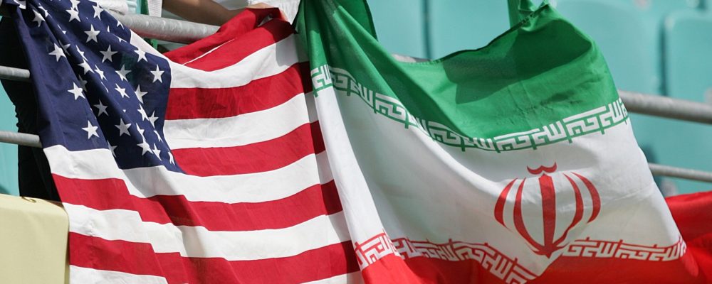 Iran fans display their flag alongside the stars and stripes of the USA ahead of the match against Angola  (Photo by EMPICS Sport - PA Images via Getty Images)