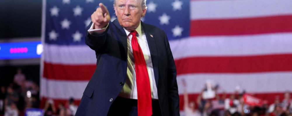 Former U.S. President and Republican presidential candidate Donald Trump gestures during a campaign event in Philadelphia, Pennsylvania, U.S., June 22, 2024. REUTERS/Tom Brenner     TPX IMAGES OF THE DAY