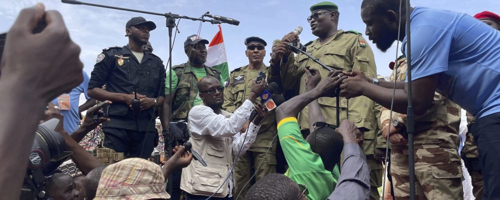 FILE - Mohamed Toumba, one of the soldiers who ousted Nigerian President Mohamed Bazoum, addresses supporters of Niger's ruling junta in Niamey, Niger, Sunday, Aug. 6, 2023. The U.S. is making precautionary plans to evacuate two key drone and counter-terror bases in Niger if that becomes necessary under the West African nation’s new ruling junta. That word came Friday, Aug. 18, from the Air Force commander for Africa, Gen. James Hecker. The Air Force general stressed to reporters in Washington that there had been no U.S. decision to evacuate Niger, which has been the United States' top counter-terror outpost in West Africa's Sahara and Sahel regions. (AP Photo/Sam Mednick, File)