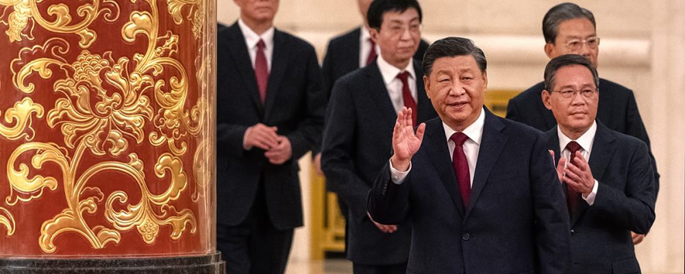 BEIJING, CHINA - OCTOBER 23: Members of the new Standing Committee of the Political Bureau of the Communist Party of China General Secretary and Chinese President  Xi Jinping, left, walks with Li Qiang, Zhao Leji, Wang Huning, Can Qi, and Li Xi as they arrive for a group photo at a meeting with Chinese and Foreign Journalists at The Great Hall of People on October 23, 2022 in Beijing, China. (Photo by Kevin Frayer/Getty Images)