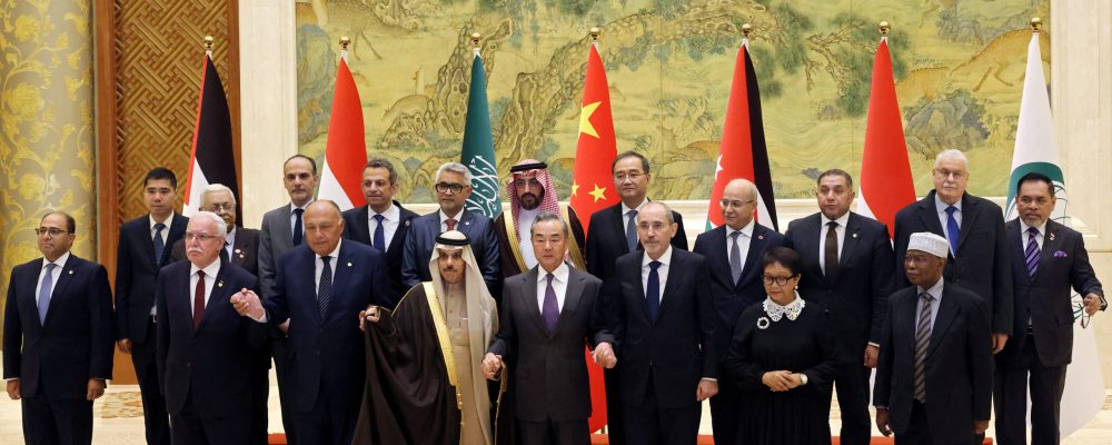 Chinese Foreign Minister Wang Yi attends a family photo session with Saudi Foreign Minister Prince Faisal bin Farhan Al Saud, Jordanian Deputy Prime Minister and Foreign Minister Ayman Safadi, Egyptian Foreign Minister Sameh Shoukry, Indonesian Foreign Minister Retno Marsudi, Palestinian Foreign Minister Riyad Al-Maliki and Organisation of Islamic Cooperation (OIC) Secretary-General Hissein Brahim Taha at the Diaoyutai State Guesthouse in Beijing, China November 20, 2023. REUTERS/Florence Lo/Pool