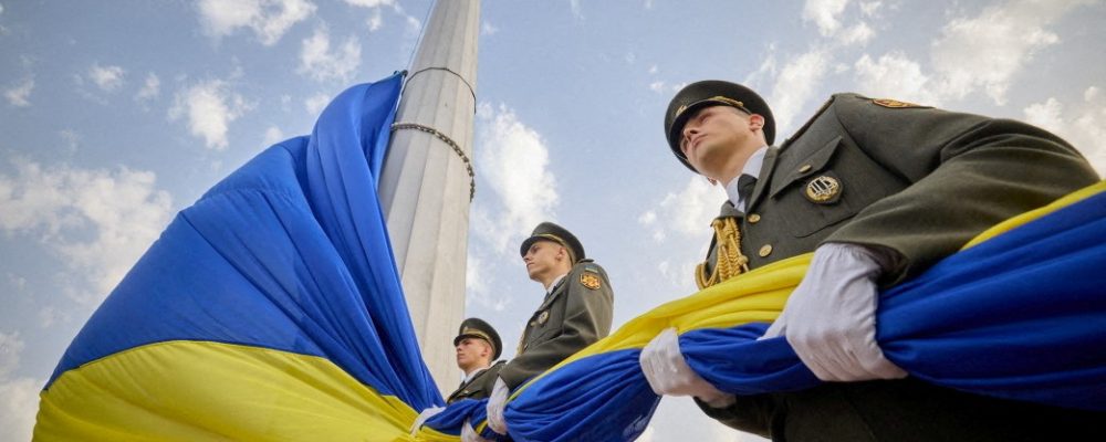 Members of the Honour Guard attend a rising ceremony of the Ukraine's biggest national flag to mark the Day of the State Flag, amid Russia's attack on Ukraine, in Kyiv, Ukraine August 23, 2022.  Ukrainian Presidential Press Service/Handout via REUTERS ATTENTION EDITORS - THIS IMAGE HAS BEEN SUPPLIED BY A THIRD PARTY.     TPX IMAGES OF THE DAY