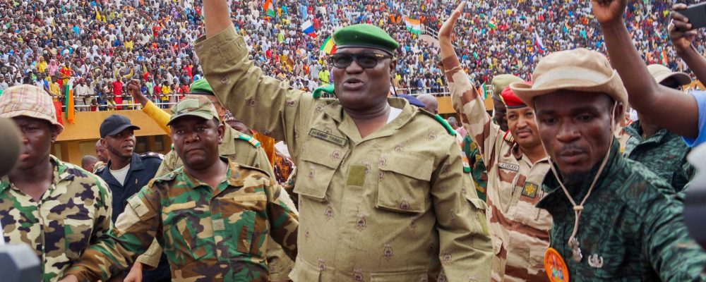 NIAMEY, NIGER - AUGUST 06: Mohamed Toumba, one of the leading figures of the National Council for the Protection of the Fatherland, attends the demonstration of coup supporters and greets them at a stadium in the capital city of Niger, Niamey on August 6, 2023. The 7-day deadline given by Economic Community of West African States (ECOWAS) to the military junta on July 30 for the release and reinstatement of President Mohamed Bazum will expire before midnight. (Photo by Balima Boureima/Anadolu Agency via Getty Images)