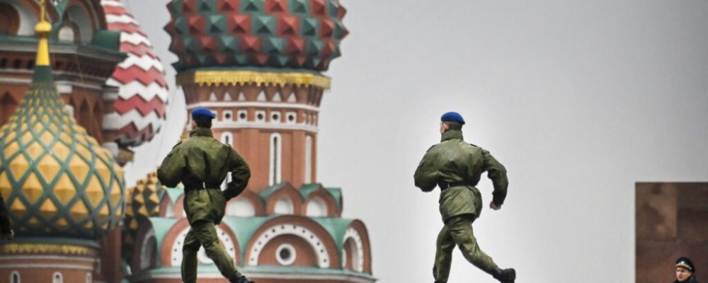 TOPSHOT - Russian soldiers run along Red Square in central Moscow on September 29, 2022, as the square is sealed prior to a ceremony of the incorporation of the new territories into Russia. - Russia will formally annex four territories of Ukraine its troops occupy at a grand ceremony in Moscow on Friday, the Kremlin has announced, after Russia suggested it could to use nuclear weapons to defend the territories. (Photo by Alexander NEMENOV / AFP) (Photo by ALEXANDER NEMENOV/AFP via Getty Images)