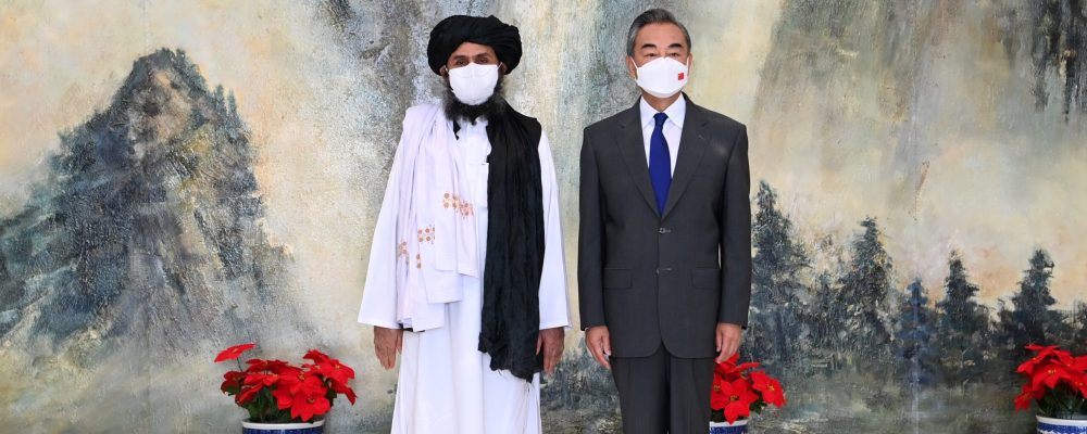 Chinese State Councilor and Foreign Minister Wang Yi meets with Mullah Abdul Ghani Baradar, political chief of Afghanistan's Taliban, in north China's Tianjin, July 28, 2021. (Photo by Li Ran/Xinhua via Getty Images)